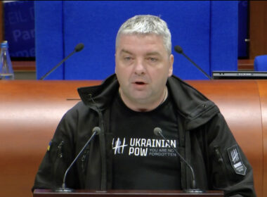 Maksym Butkevych delivers his acceptance speech at the Parliamentary Assembly of the Council of Europe in Strasbourg on 29 September, wearing a hoodie with the message 