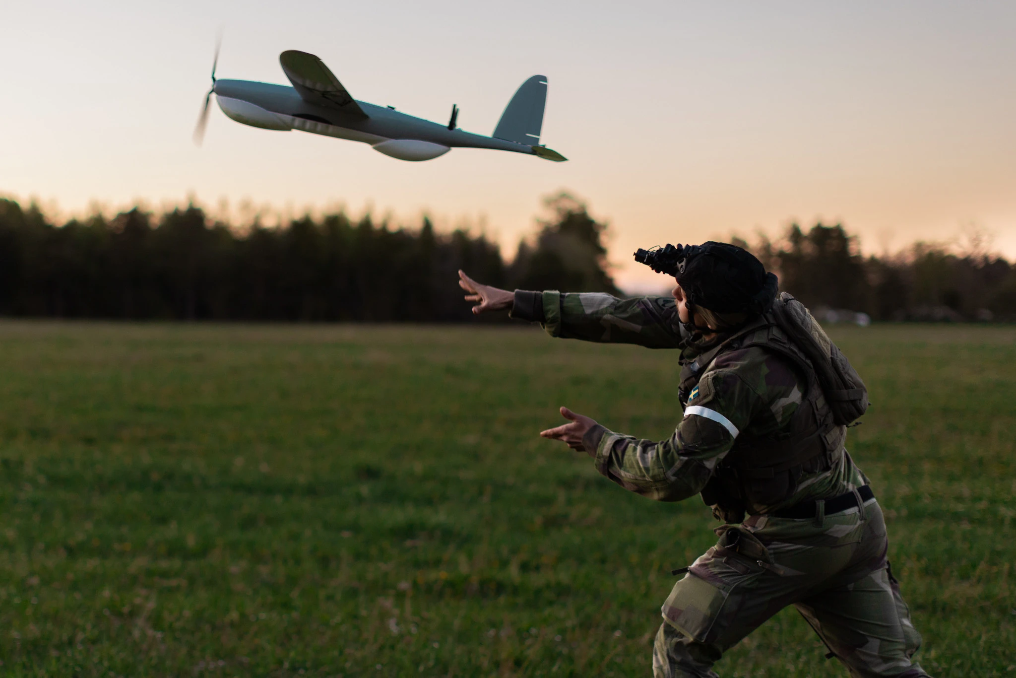 A Swedish Army drone operator launches a reconnaissance drone on Gotland Island during Exercise Aurora 26 in Sweden. Ukraine's Armed Forces sent drone operators to the exercise to pass on lessons learned to their NATO counterparts and to act as a challenging opposing force for Allied soldiers. More than 18,000 soldiers from 13 countries took part. (Photo: NATO)