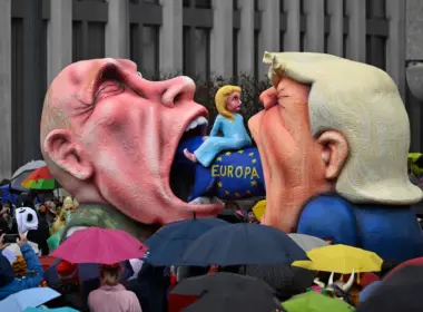 A carnival float by Jacques Tilly shows Trump and Putin eating a cow ridden by Ursula von der Leyen, at the Rose Monday parade in Düsseldorf, Germany, on 16 February 2026. Photo: Ina Fassbender/AFP/Eastnews