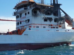 The San Marino-flagged chemical tanker Wine Trader near Sulina, Romania, on 15 October 2026, after it was hit by drones about 14 nautical miles off the coast. Seven of its 12 crew were reported missing. Photo: ARSVOM