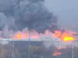 russia’s st petersburg wakes up burning oil sites hit bridge damaged data center after night ukrainian drones · post fire ozon distribution kolpinsky district drone attack 18 2026 astra ukraine