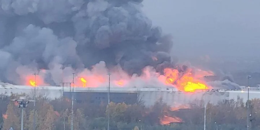 russia’s st petersburg wakes up burning oil sites hit bridge damaged data center after night ukrainian drones · post fire ozon distribution kolpinsky district drone attack 18 2026 astra ukraine